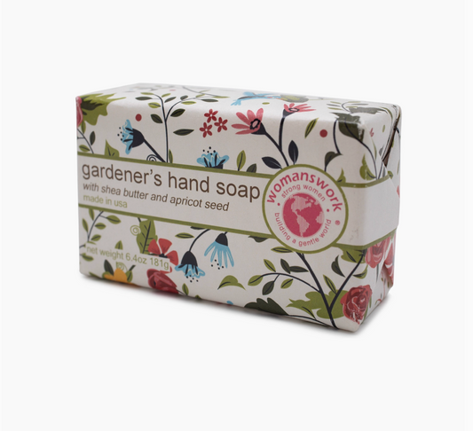 A bar of gardener's hand soap with a floral garden print on the outside of the paper packaging. 