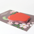 Load image into Gallery viewer, Apple-shaped sticky notes on a brown backing card that features florals and a green worm sticking out of the worm.
